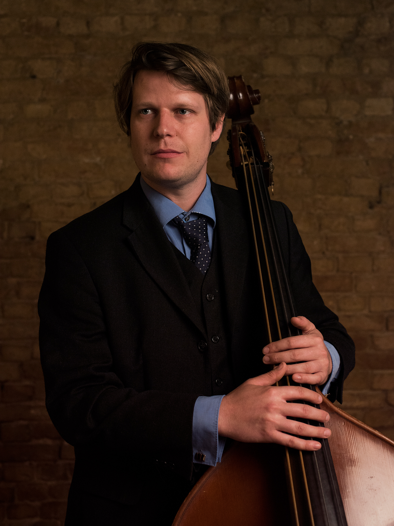 Ben Lehmann performing bass for The Jungle Jazz Band, a key member of Berlin's jazz scene.